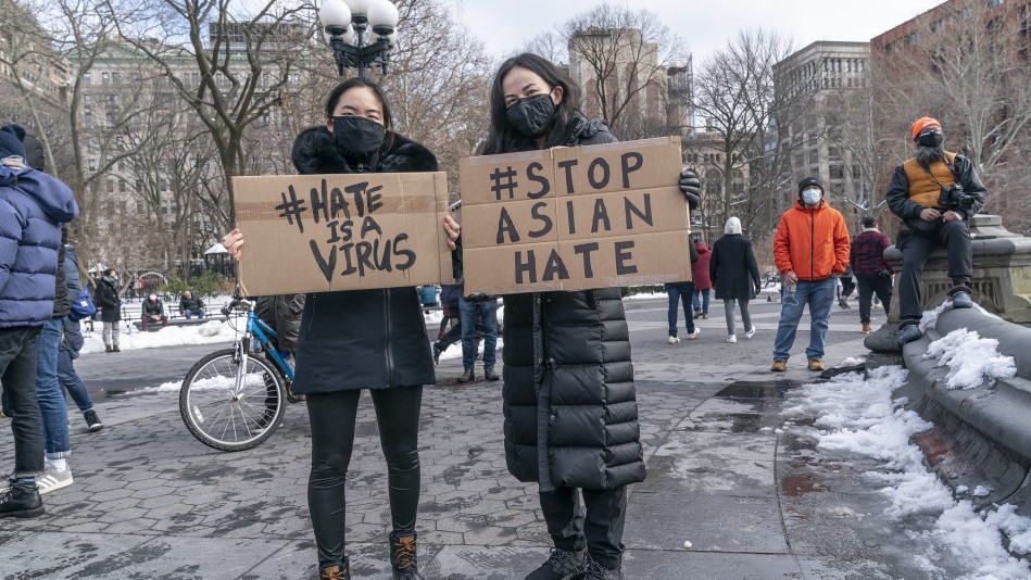 Women protesting hate crimes against Asian people