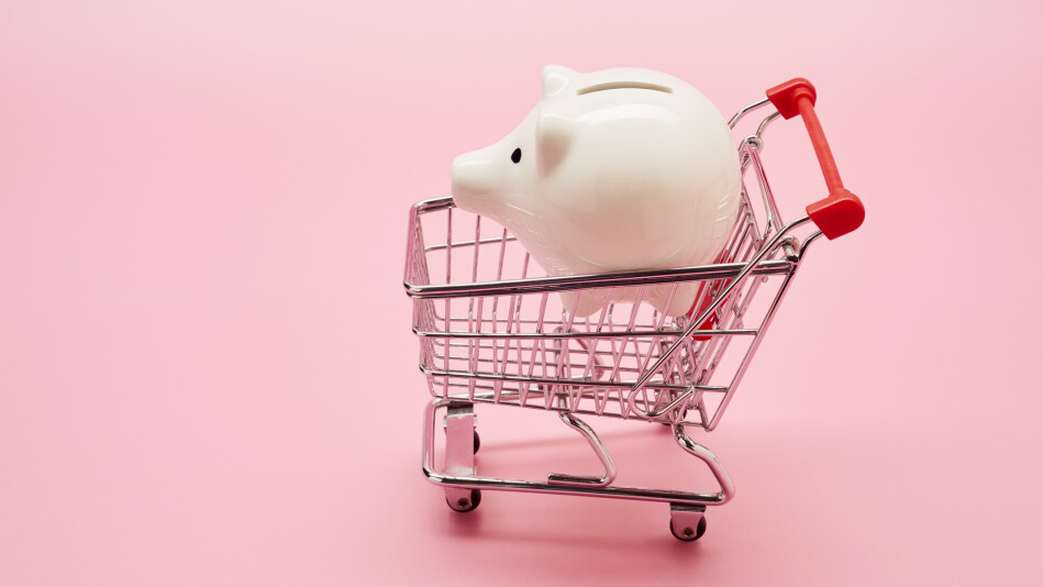 piggy bank inside shopping cart