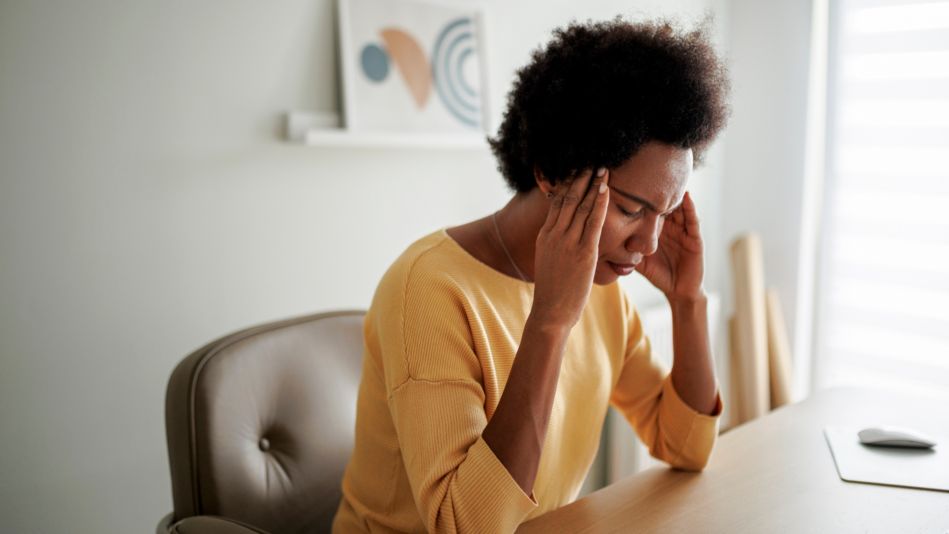 Black woman experiencing acute stress