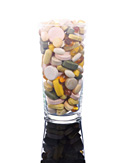 Pills in a glass