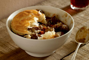 Puff pastry disk on top of steak and kidney pie