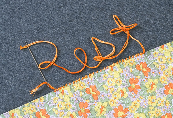 Yarn spelling out the word rest