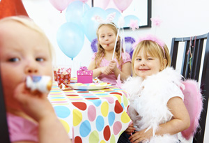 Children playing at birthday party