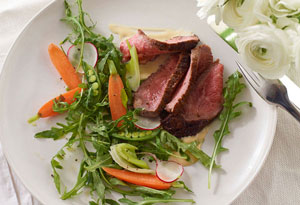 warm rare beef salad with miso mustard and spring vegetables