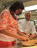 Michelle Obama and assistant White House chef Sam Kass