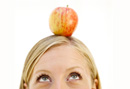 Apple on woman's head