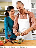 Couple cooking in kitchen