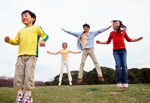 Jumping jacks are a great outdoor family activity.