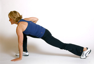 Andrea Metcalf demonstrates the low lunge stretch.