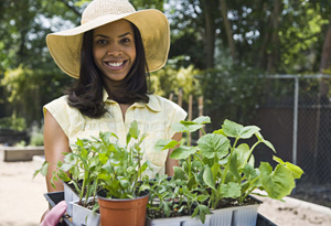 Woman holding plants