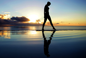 Woman walking on the ocean