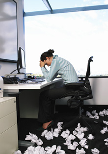 Woman stressed out at work