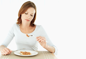 Woman questioning what she's eating