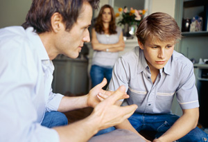 Parents talking with teenage son