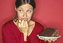 Woman with chocolate cake.