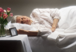 Older woman in bed