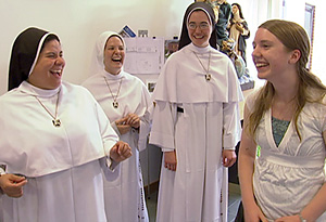 Nuns arrive at the convent.